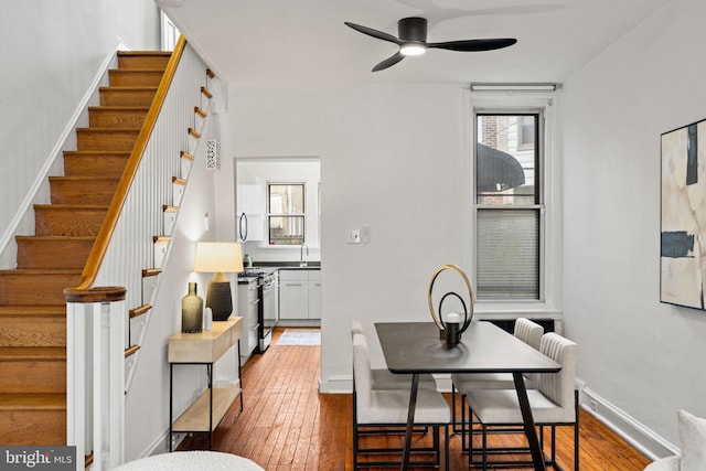 828 Mercer St, Philadelphia, PA 19125 - dining room featuring stairway, wood-type flooring, and ceiling fan