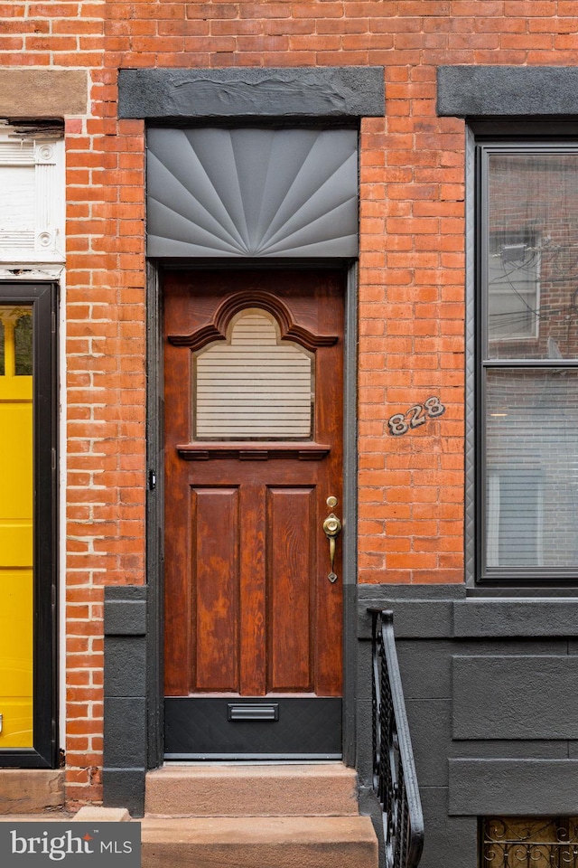 828 Mercer St, Philadelphia, PA 19125 - property entrance featuring brick siding