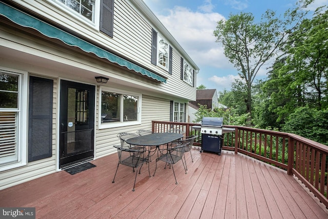 1109 Pipestem Pl, Potomac, MD 20854 - wooden terrace featuring grilling area and outdoor dining space