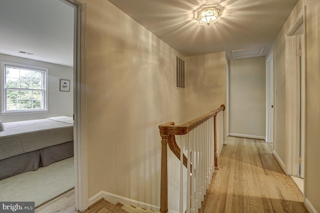 1109 Pipestem Pl, Potomac, MD 20854 - hallway featuring an upstairs landing and wood finished floors