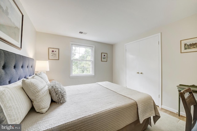 1109 Pipestem Pl, Potomac, MD 20854 - bedroom with light wood-style flooring and baseboards