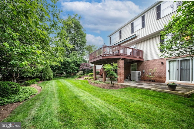 1109 Pipestem Pl, Potomac, MD 20854 - view of grassy yard with a deck and a patio area