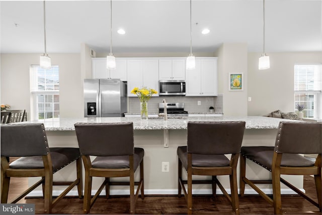 7802 Richard Halley Way, Elkridge, MD 21075 - kitchen featuring stainless steel appliances, tasteful backsplash, white cabinets, dark wood-type flooring, and recessed lighting