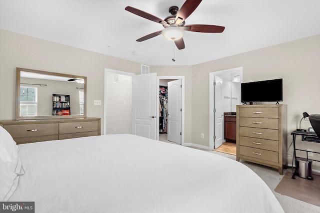 7802 Richard Halley Way, Elkridge, MD 21075 - bedroom featuring a walk in closet, connected bathroom, and a ceiling fan