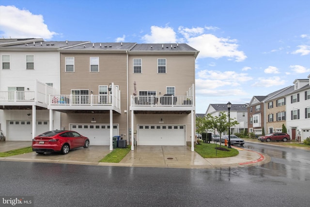 7802 Richard Halley Way, Elkridge, MD 21075 - back of property with a residential view, an attached garage, and driveway