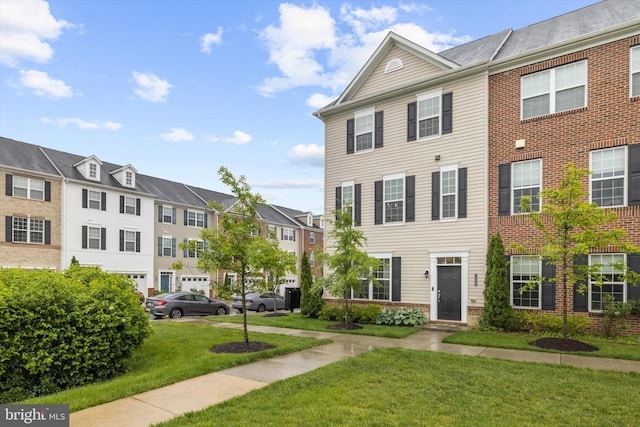 7802 Richard Halley Way, Elkridge, MD 21075 - townhome / multi-family property featuring a front yard and a residential view