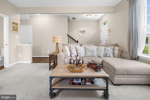 7802 Richard Halley Way, Elkridge, MD 21075 - carpeted living area featuring stairway and baseboards