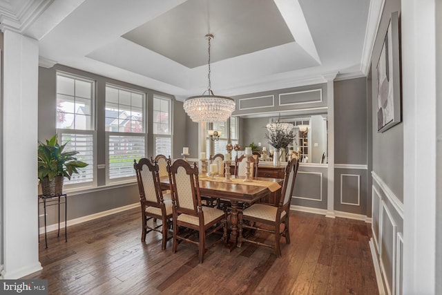 14401 Chalfont Dr, Haymarket, VA 20169 - dining room featuring dark wood finished floors, a chandelier, healthy amount of natural light, a raised ceiling, and a decorative wall