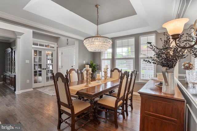 14401 Chalfont Dr, Haymarket, VA 20169 - dining room featuring a chandelier, dark wood finished floors, a raised ceiling, french doors, and ornamental molding