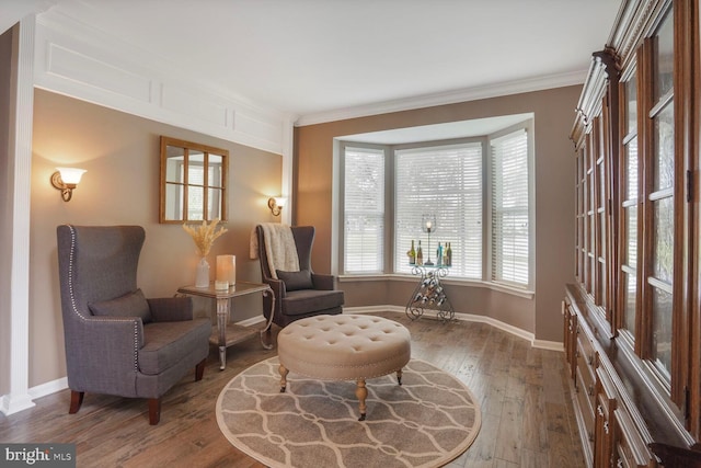 14401 Chalfont Dr, Haymarket, VA 20169 - sitting room featuring wood-type flooring and ornamental molding