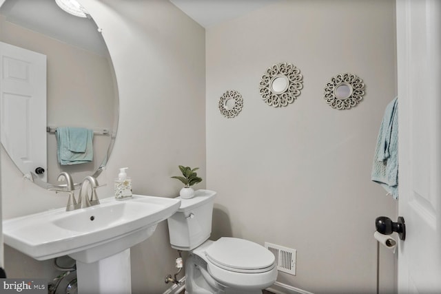 14401 Chalfont Dr, Haymarket, VA 20169 - half bath with toilet and a sink