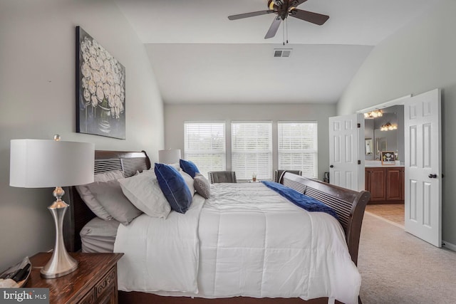 14401 Chalfont Dr, Haymarket, VA 20169 - bedroom featuring vaulted ceiling, light carpet, and ensuite bath