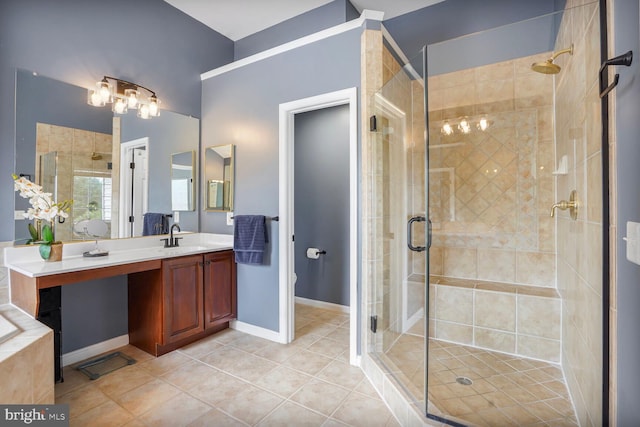 14401 Chalfont Dr, Haymarket, VA 20169 - bathroom featuring a stall shower, vanity, and tile patterned floors