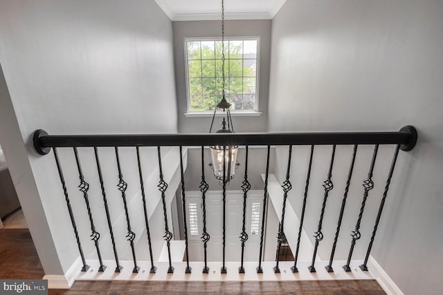 14401 Chalfont Dr, Haymarket, VA 20169 - staircase with crown molding, wood finished floors, and a chandelier
