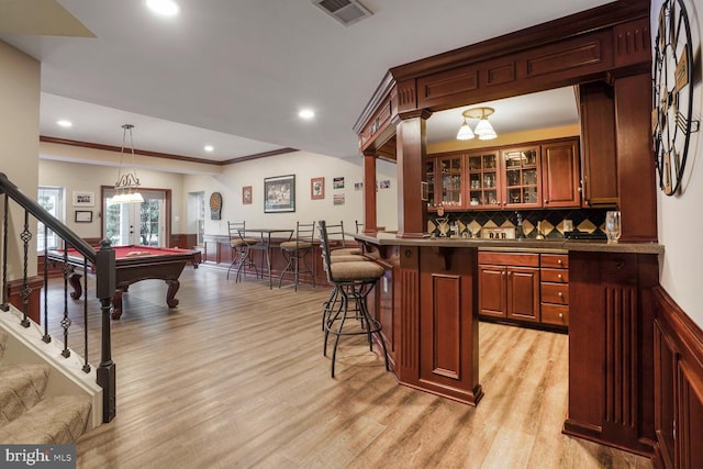 14401 Chalfont Dr, Haymarket, VA 20169 - indoor bar with stairs, light wood-type flooring, backsplash, billiards table, and pendant lighting