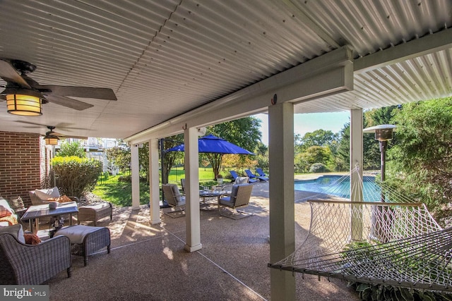 14401 Chalfont Dr, Haymarket, VA 20169 - view of patio featuring outdoor dining area, an outdoor pool, and a ceiling fan