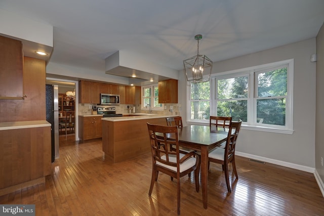 561 Nottingham Dr, Yardley, PA 19067 - dining space featuring wood-type flooring and a chandelier