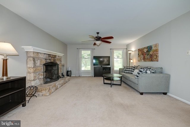 561 Nottingham Dr, Yardley, PA 19067 - carpeted living area featuring a ceiling fan and a fireplace