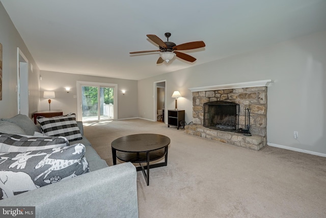 561 Nottingham Dr, Yardley, PA 19067 - carpeted living room with a fireplace and a ceiling fan