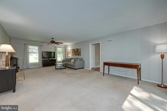561 Nottingham Dr, Yardley, PA 19067 - carpeted living area featuring a ceiling fan and baseboards