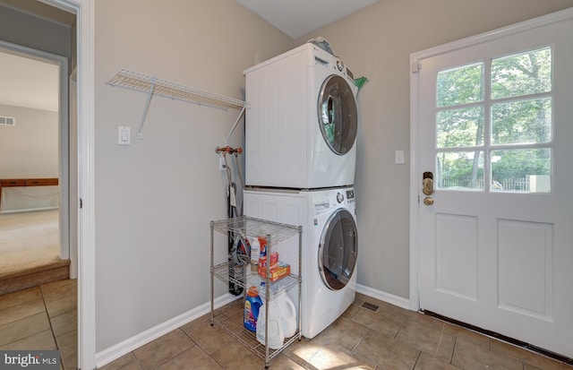 561 Nottingham Dr, Yardley, PA 19067 - washroom featuring stacked washer / drying machine and tile patterned floors