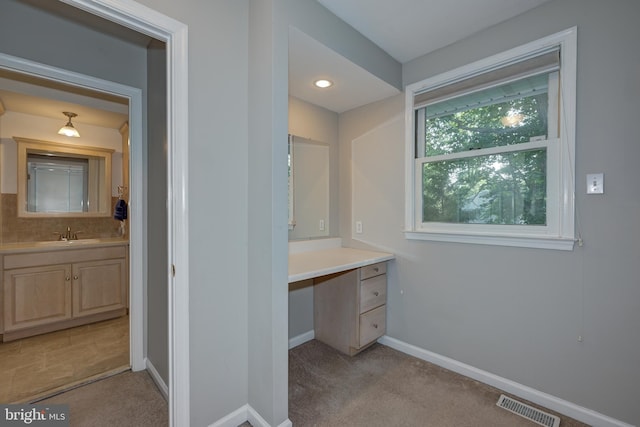 561 Nottingham Dr, Yardley, PA 19067 - bathroom with vanity and tasteful backsplash