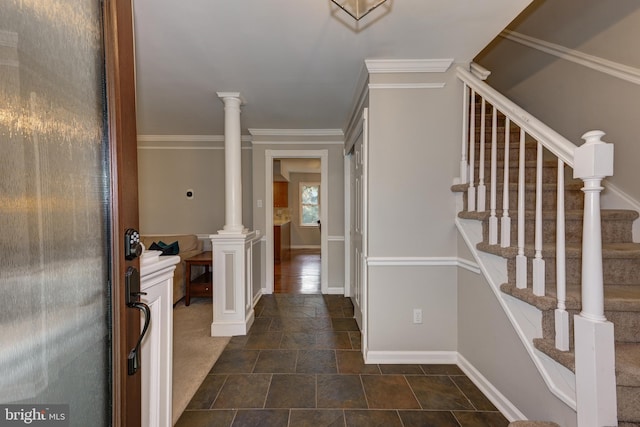 561 Nottingham Dr, Yardley, PA 19067 - entryway with stone tile flooring, stairway, decorative columns, and crown molding