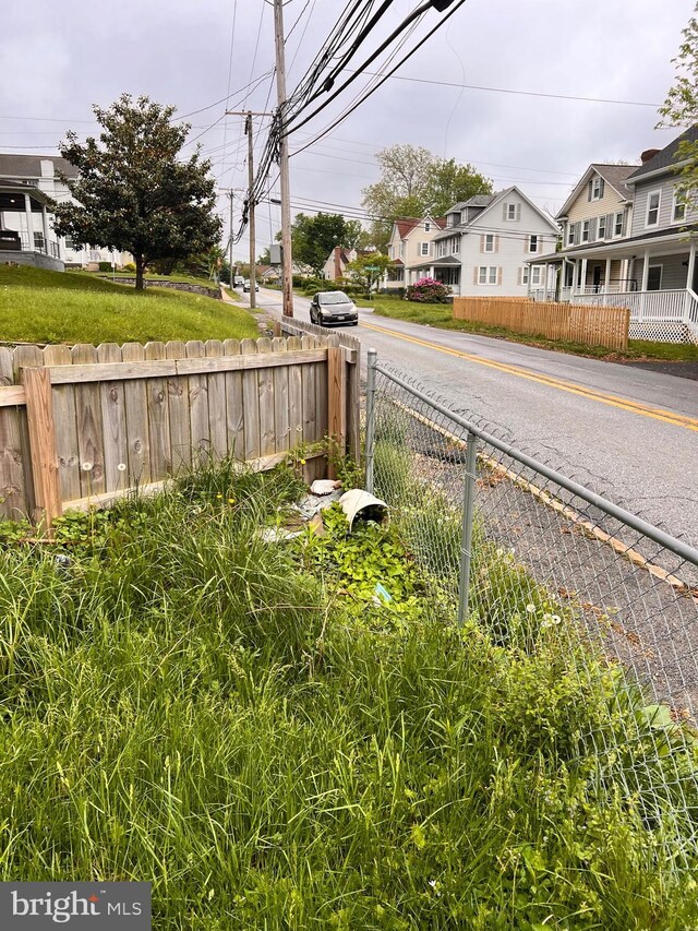 518 Ingleside Ave, Baltimore, MD 21228 - view of asphalt street featuring a residential view