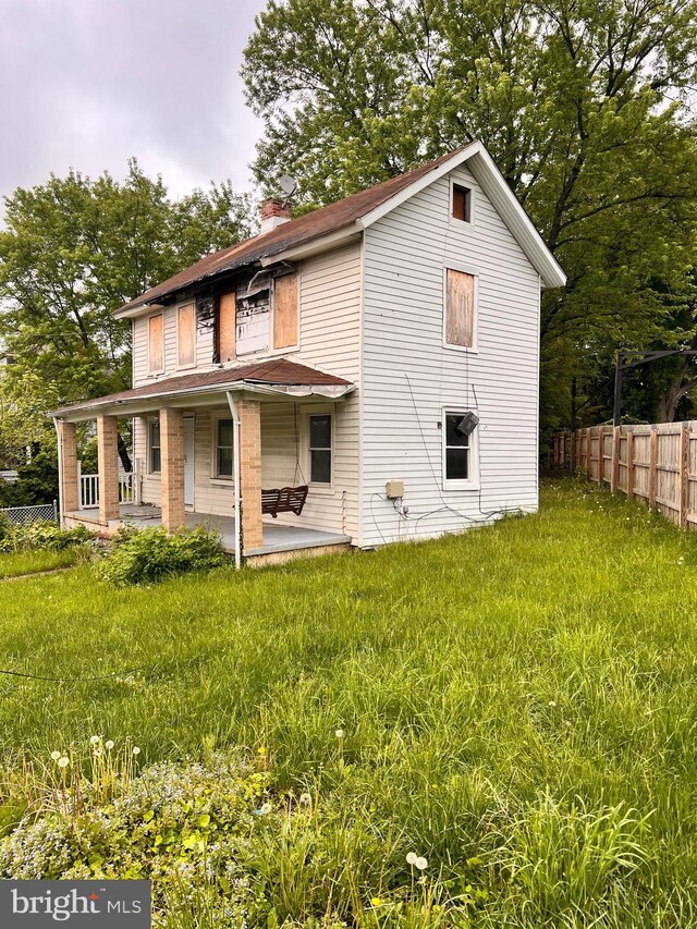 518 Ingleside Ave, Baltimore, MD 21228 - back of property featuring a chimney