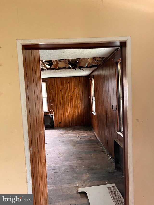 518 Ingleside Ave, Baltimore, MD 21228 - corridor featuring wooden walls and wood finished floors