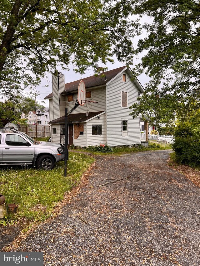 518 Ingleside Ave, Baltimore, MD 21228 - view of front of house featuring a chimney