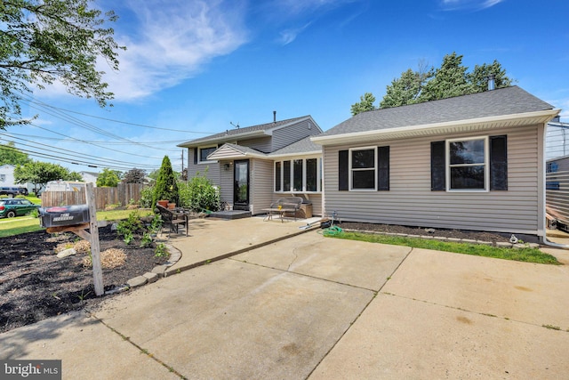 487 College Blvd, Wenonah, NJ 08090 - view of front facade with a patio area, a shingled roof, and entry steps