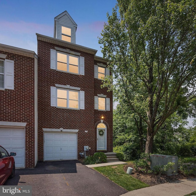 205 Dylan Dr Unit 54, Lansdale, PA 19446 - view of front of property with an attached garage, driveway, and brick siding