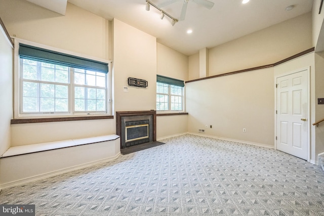 205 Dylan Dr Unit 54, Lansdale, PA 19446 - unfurnished living room with a fireplace with flush hearth, carpet flooring, high vaulted ceiling, recessed lighting, and ceiling fan