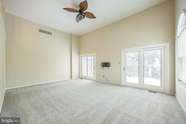 205 Dylan Dr Unit 54, Lansdale, PA 19446 - spare room featuring a towering ceiling, carpet, plenty of natural light, and a ceiling fan