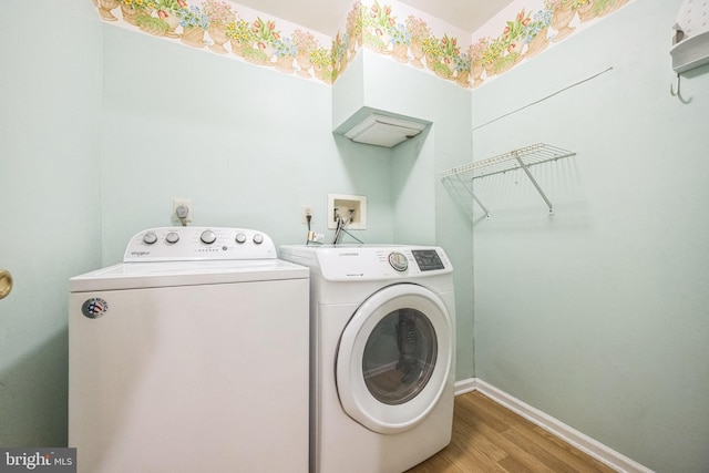 205 Dylan Dr Unit 54, Lansdale, PA 19446 - laundry area featuring washer and dryer and wood finished floors