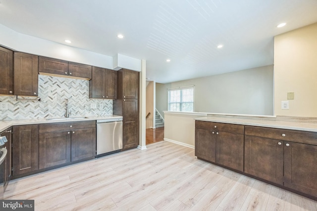 205 Dylan Dr Unit 54, Lansdale, PA 19446 - kitchen with dishwasher, dark brown cabinets, light wood-style floors, light countertops, and tasteful backsplash