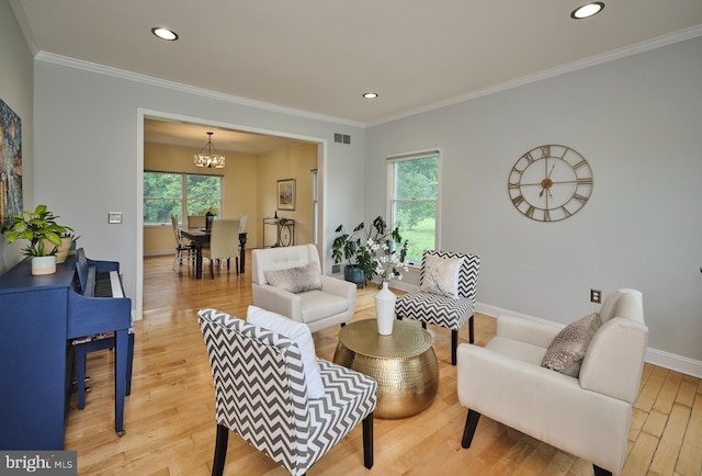 21 Shara Ln, Pennington, NJ 08534 - living room with a chandelier, healthy amount of natural light, light wood-type flooring, crown molding, and recessed lighting