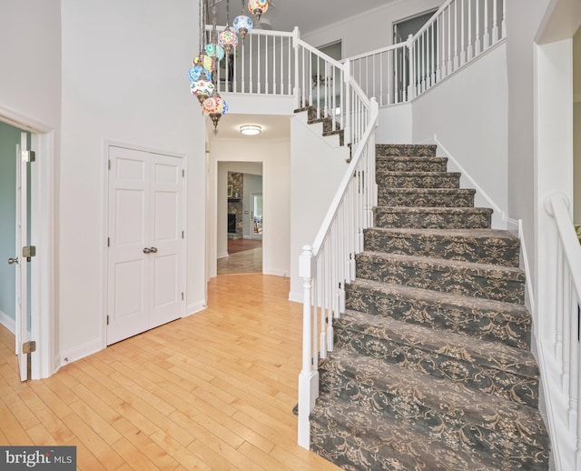 21 Shara Ln, Pennington, NJ 08534 - foyer with a high ceiling, light wood-style flooring, stairway, and crown molding