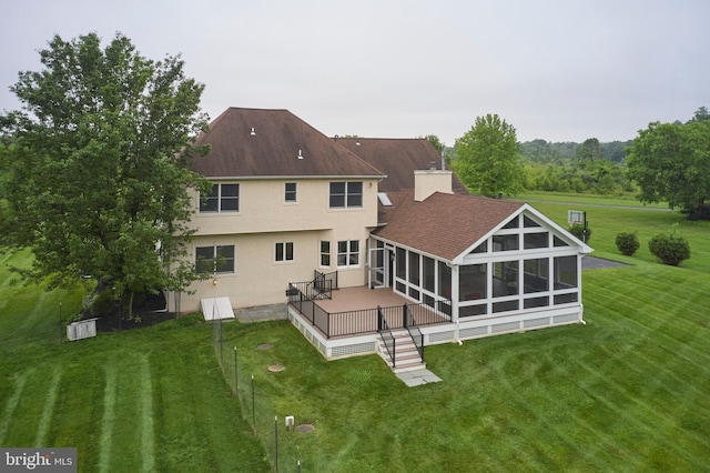 21 Shara Ln, Pennington, NJ 08534 - back of house featuring a sunroom, stucco siding, a yard, and roof with shingles