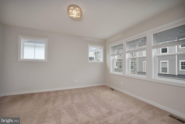 20769 Partlows Store Sq, Ashburn, VA 20147 - spare room featuring carpet floors and baseboards