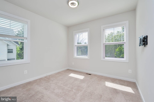 20769 Partlows Store Sq, Ashburn, VA 20147 - carpeted empty room with baseboards