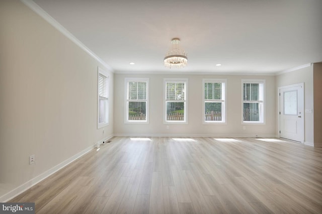20769 Partlows Store Sq, Ashburn, VA 20147 - spare room with ornamental molding, a chandelier, light wood-type flooring, and recessed lighting