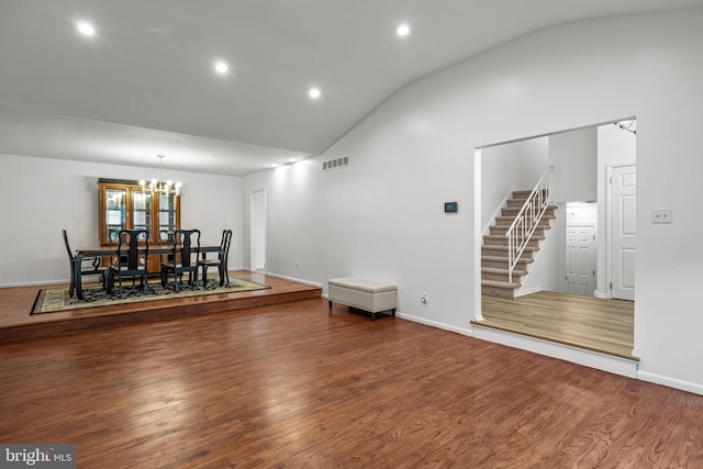 951 Robin Ln, Huntingdon Valley, PA 19006 - living room with lofted ceiling, stairs, a chandelier, recessed lighting, and wood finished floors
