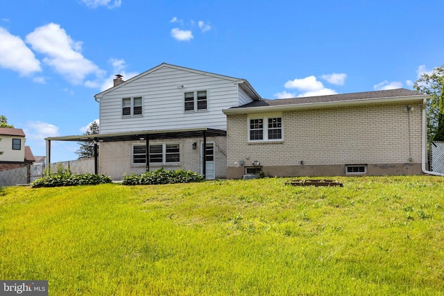 951 Robin Ln, Huntingdon Valley, PA 19006 - rear view of house with brick siding and a chimney