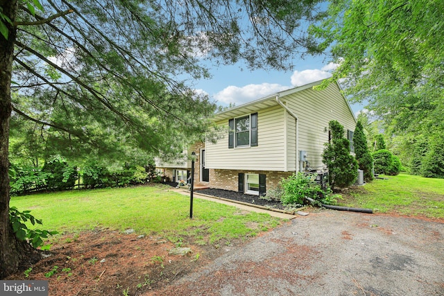 41 Sycamore Ln, Hanover, PA 17331 - view of home's exterior with a yard and brick siding