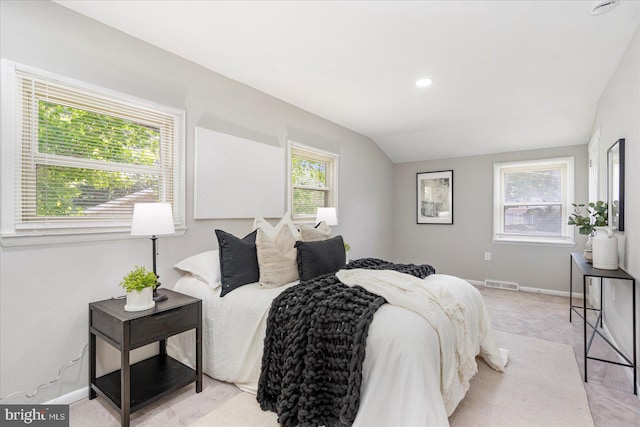 1427 Perrywood Dr, Aberdeen, MD 21001 - bedroom featuring multiple windows, light colored carpet, and vaulted ceiling