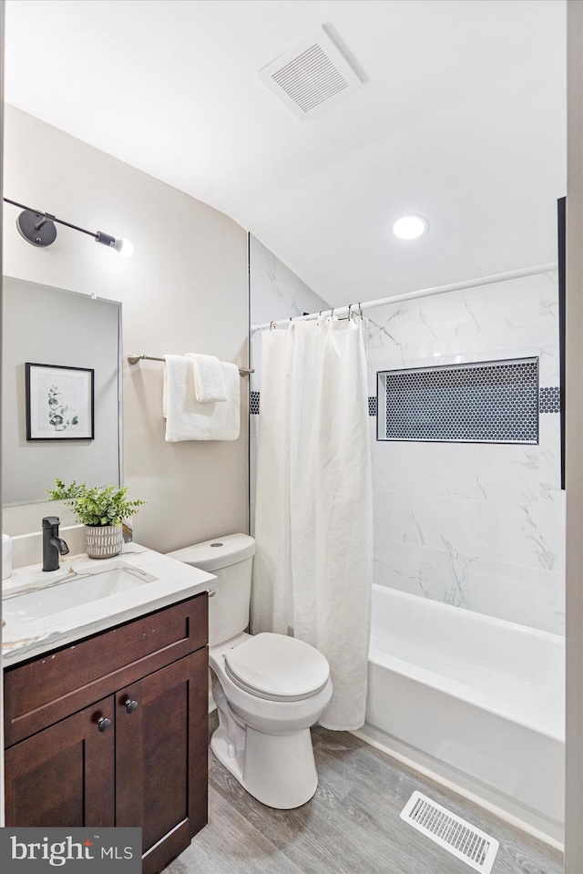 1427 Perrywood Dr, Aberdeen, MD 21001 - bathroom with vanity, wood finished floors, shower / bath combo with shower curtain, and recessed lighting