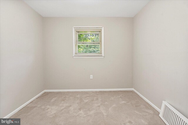 1427 Perrywood Dr, Aberdeen, MD 21001 - spare room featuring light carpet and baseboards
