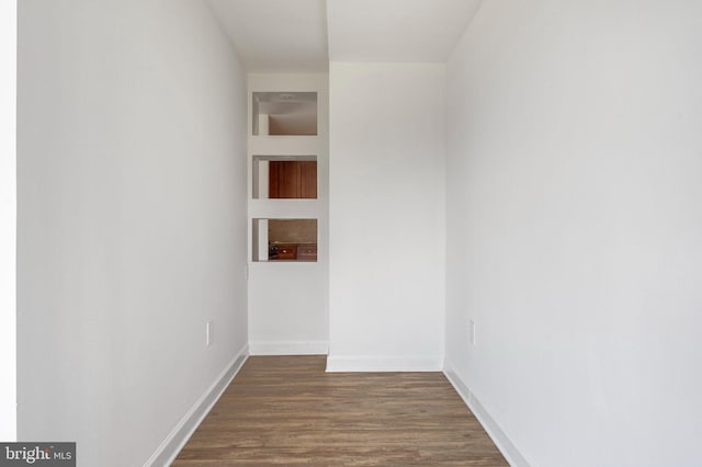 1111 Arlington Blvd Unit 707, Arlington, VA 22209 - unfurnished room featuring dark wood-style floors and baseboards